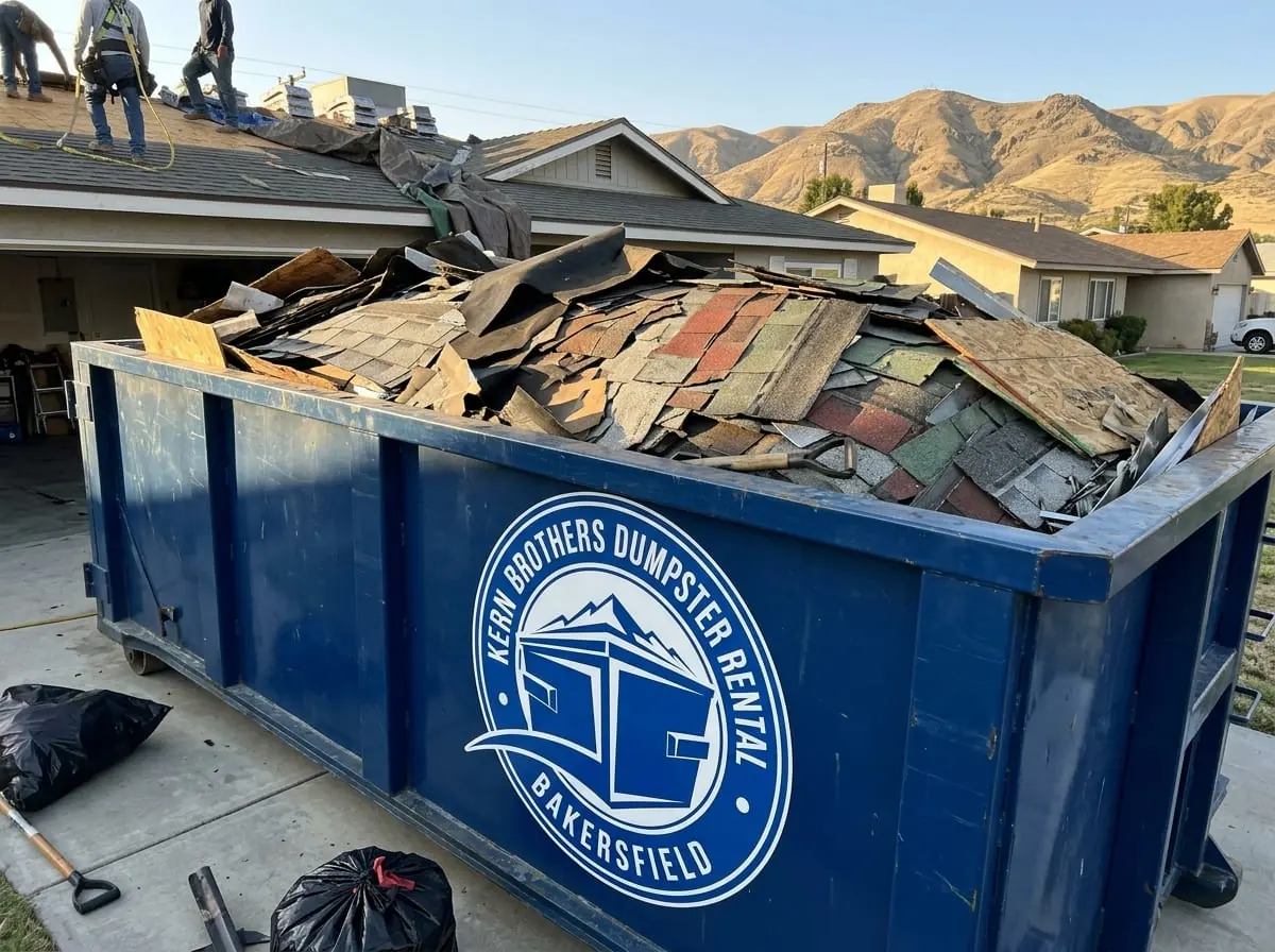 Loaded roll-off dumpster and tonnage weight Roll-off dumpster loaded with roofing and renovation debris near Bakersfield, CA